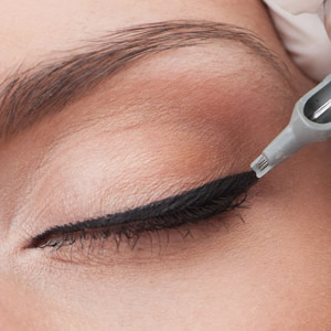 Jan Barry, permanent makeup artist shows how to apply permanent eyeliner